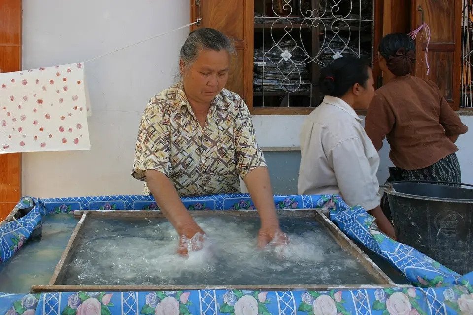 Making saa paper by hand in Luang Prabang